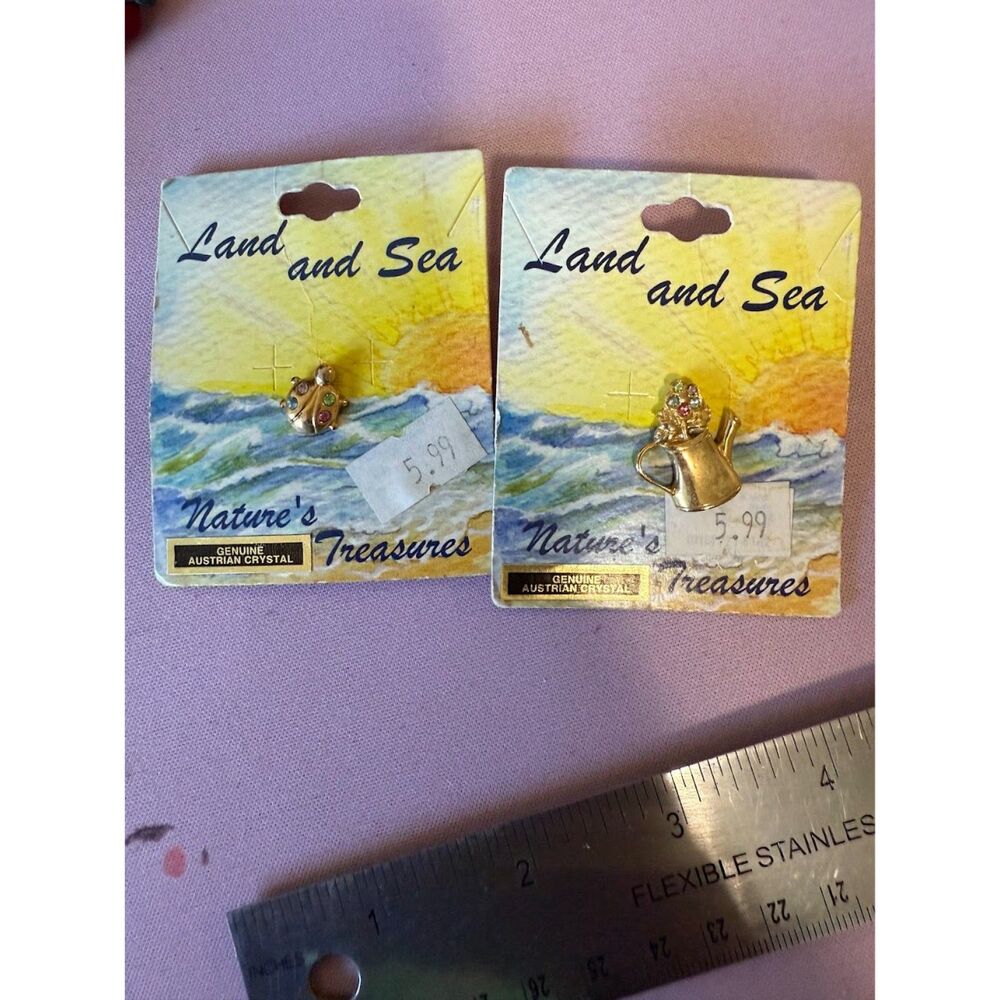 vintage "Land and Sea" pins from the brand Nature's Treasures